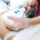 A woman receiving CoolSculpting in San Antonio, TX